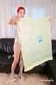 Morrigan - posing in yellow trash bag dress
