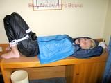 Archive girl tied and gagged with tape and rope wearing shiny nylon rainwear in blue (Pics)