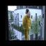 Get 2 Videos with Monika enjoying her Shiny Nylon Rainwear from our 2010 Archive