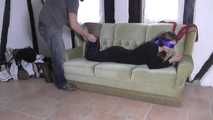 Vanessa hogtie on couch 1/2