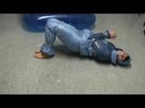 0300 min video with Simone tied and gagged in shiny nylon sky suit 