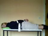 Hogtied on the table