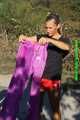Watch Sandra enjoying her shiny nylon Suit riding a Bike