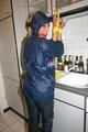 Stella tied, gagged and hooded in the kitchen wearing supersexy blue rainwear (Pics)