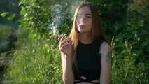 18 y.o. Margarita is smoking three cork 120mm cigarettes outdoors