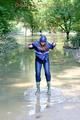 Stella jumping in puddles wearing sexy blue shiny nylon rainwear and rubber boots (Pics)