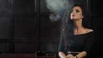 Gorgeous brunette Daria enjoying a cigarette in the hot smoking video