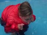 Watch Sandra enjoying the Pool during a hot summer Day with her shiny nylon Downjacket