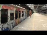 Chris walking nude at the railway station
