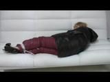 0320 min video with Samantha bound and gagged in a red down bib and a black down jacket 