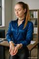 Blonde Secretary With Dark Satin Blouse