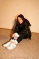 One of our archive girls bound and gagged in shiny nylon down
