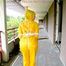 Leonie tied and gagged outdoor wearing shiny yellow rainwear (Pics)
