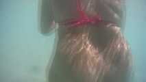 Under water - put the bikini off
