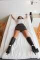 Spread eagle on bed