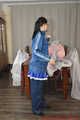 Selfbondage in PVC sailor costume and layers of nylon rainwear