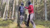 Sebastien breathplay tied up in a puffer jacket among the trees.
