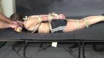 Marie hogtied and tapegagged in shiny nylon Shorts