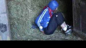 02:50 Min. video with Katharina tied and gagged in shiny nylon rainwear