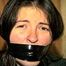 FIRST GRADE LATINA SCHOOL TEACHER IS WRAP GAGGED WITH SEMI CLEAR BROWN PACKAGING TAPE, BLACK ELECTRICAL TAPE, SILVER DUCT TAPE & MOUTH STUFFED WITH RAG (D69-4)