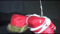 ***SEXY MARA*** wearing a supersexy black shiny nylon pants and a red shiny nylon down jacket with a coat being bound overhead with ropes and a ball gag (Video)