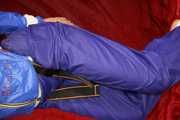 Sexy Sonja being tied and gagged with ropes and a clothgag hanging wearing a sexy rainwear combination (Pics)