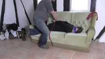 Vanessa hogtie on couch 1/2