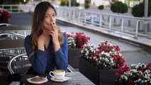 Gorgeous lady Irina having a cookie, coffee and a 120mm cigarette for lunch