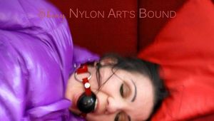 Jill tied, gagged and hooded by Sophie wearing a sexy purple Down jacket and a black rain pants (Pics)