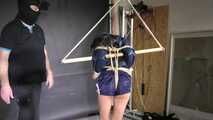 Marie bound, gagged and spanked in shiny nylon Shorts and a Windbreaker