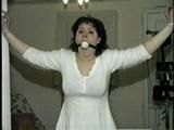 BALL-GAGGED, & TIED BETWEEN  2 PILLARS DAMSEL (D16-12)
