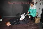 Part 2 of Stella overpowering intruder Ronja both wearing shiny nylon!