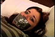 23 YR OLD REAL ESTATE BROKER IS MOUTH STUFFED WITH A SPONGE, WRAP TAPE GAGGED, GAG TALKING, RAG STUFFED IN MOUTH AND TIGHTLY HANDGAGGED  (D74-15)
