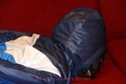Isabelle tied and gagged in shiny nylon clothes