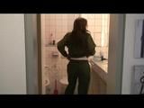 Being at home with Alina wearing shiny nylon rainwear (Video)