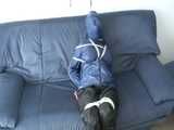 Get 3 classic archive videos with Katharina bound and gagged in shiny nylon rainwear