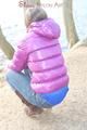 Alina during her walk on the sea wearing sexy shiny nylon down jacket and a shiny nylon shorts under her jeans (Pics)