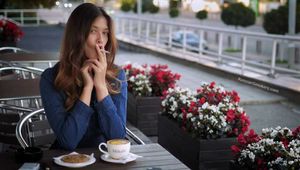 Gorgeous lady Irina having a cookie, coffee and a 120mm cigarette for lunch