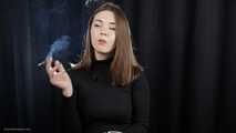 Beauty Katya is smoking 120mm cigarette in the studio