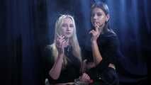 Girls Smoking close to each other