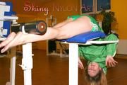 Leonie in an fitness studio wearing sexy shiny nylon shorts and a rain jakcet (Pics)