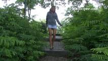 080003 Nikki Pees From A Bench