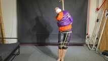 Rachel Adams bound, gagged and double hooded in shiny downjackets