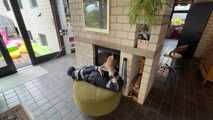 Rachel Adams bound and gagged by an Intruder in shiny Rainwear