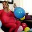 popping balloons and blow2pops in a stuffed unitard