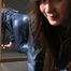 Alina posing in a studio wearing a supersexy blue rainwear combination (Pics)