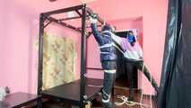 Breathplay Sebastien tied to an iron structure.