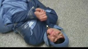 0300 min video with Simone tied and gagged in shiny nylon sky suit 