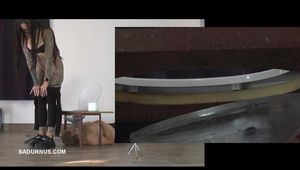 Mistress Cleo squirts cologne into the mouth of the slave lying in the toilet. Picture in Picture