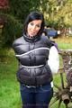 Jill ties her friend in shiny downjackets